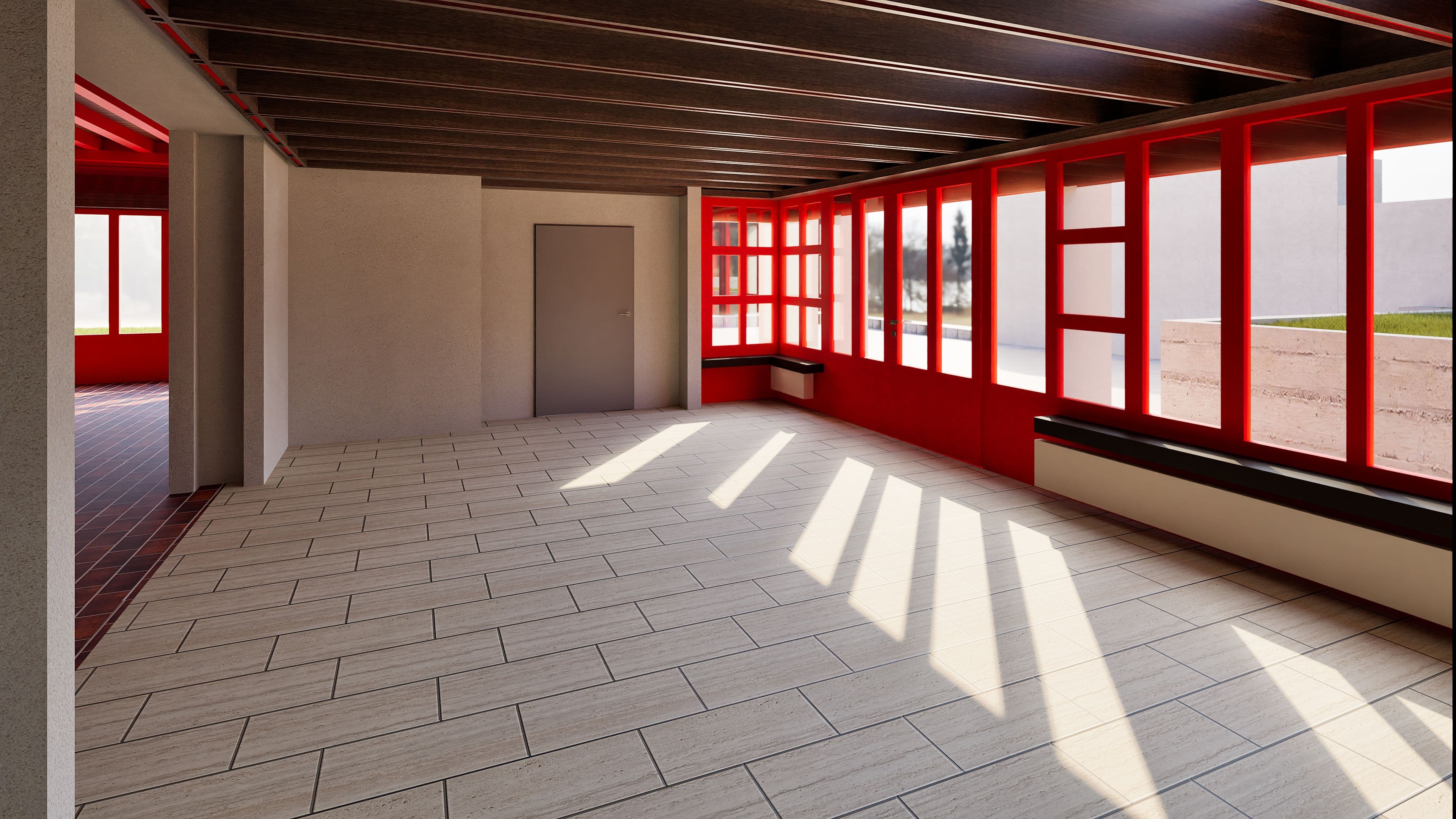 Ein heller Raum mit großen Fenstern, roten Rahmen und Holzbalkendecke. Sonnenlicht fällt auf den Fliesenboden.
