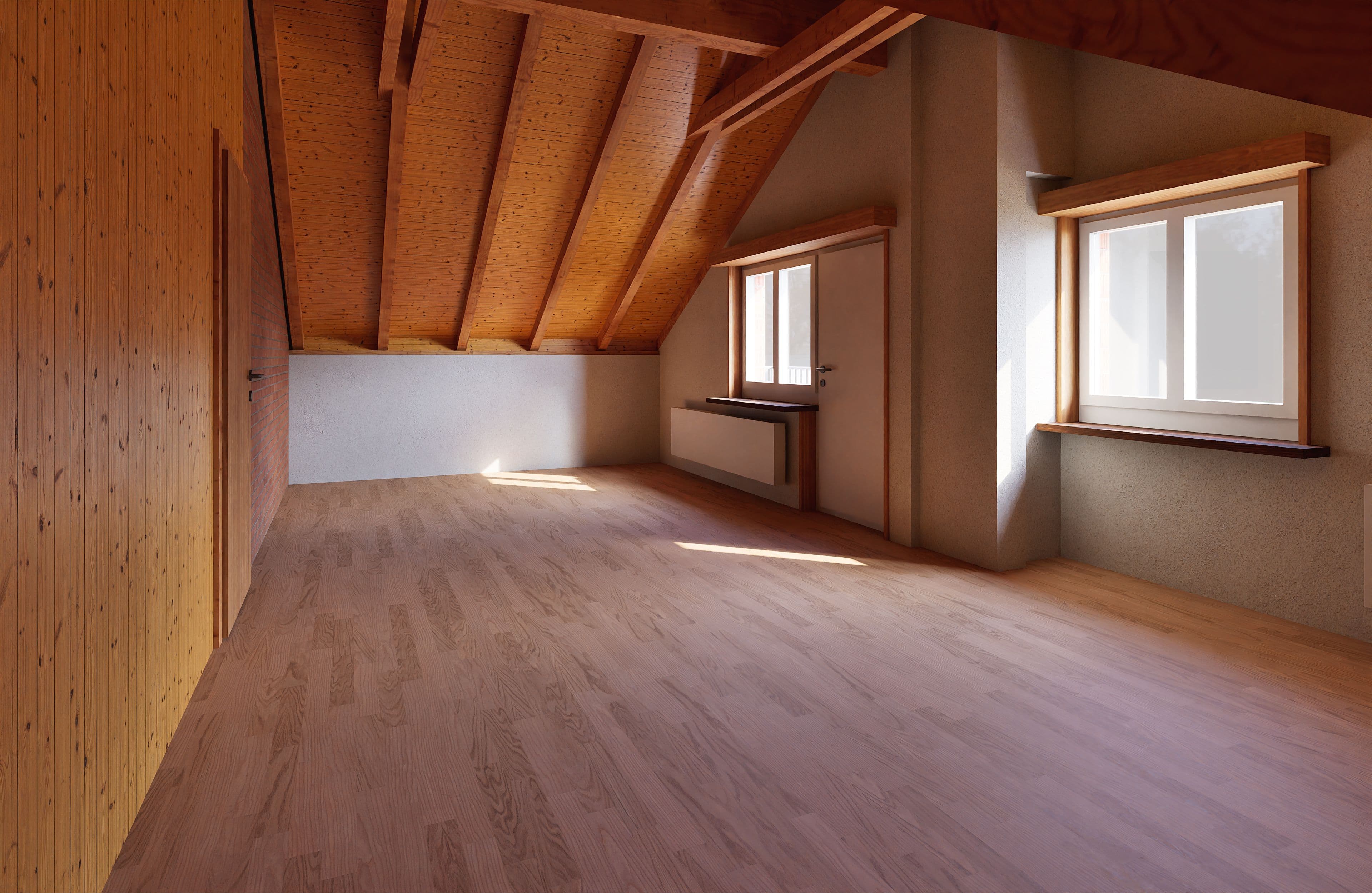 Ein leeres Dachgeschosszimmer mit Holzverkleidung, Schrägdach und zwei Fenstern, die natürliches Licht hereinlassen.