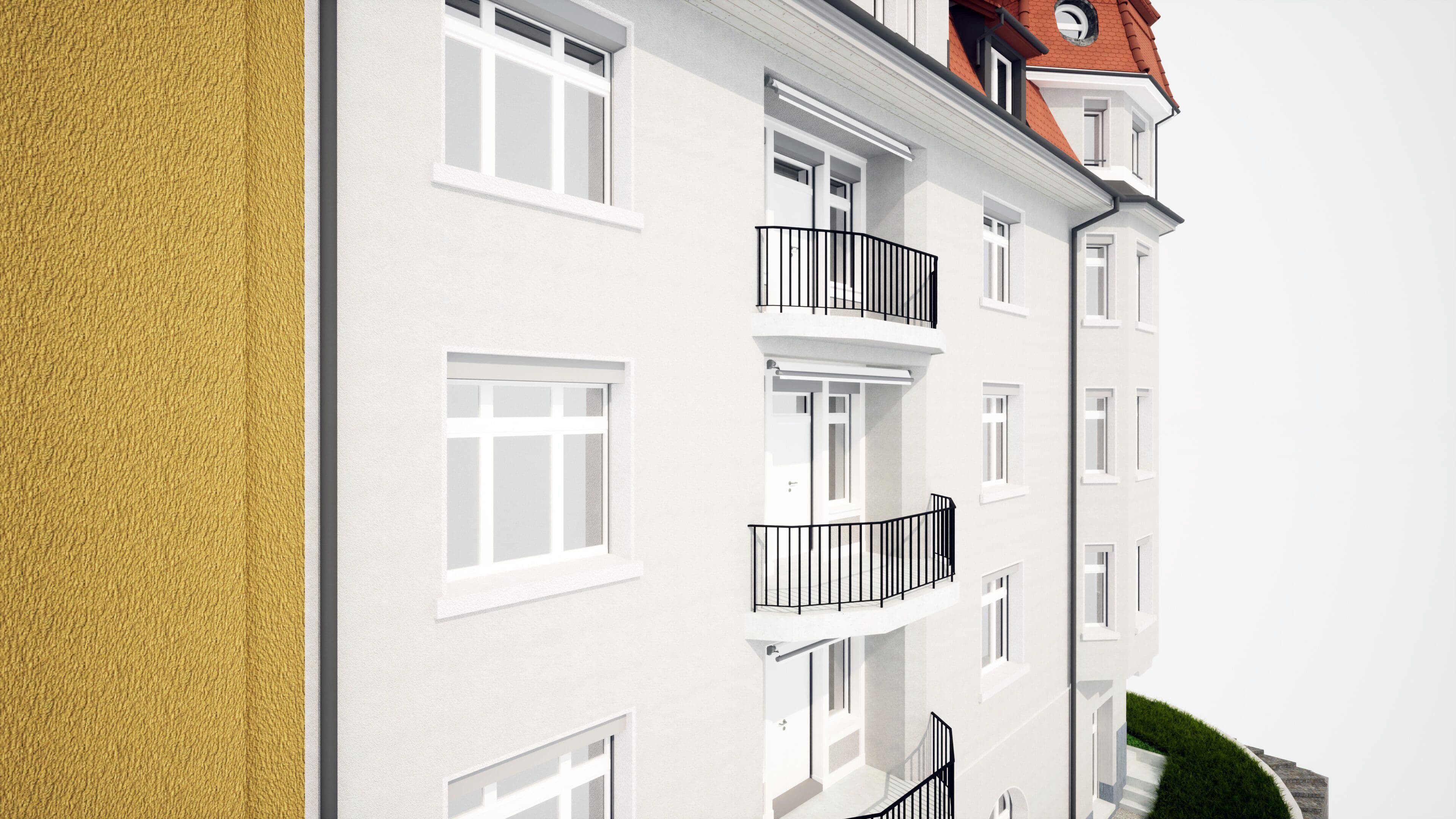 Mehrfamilienhaus mit weißen Fassaden und Balkonen, gelbe Hausseite links.