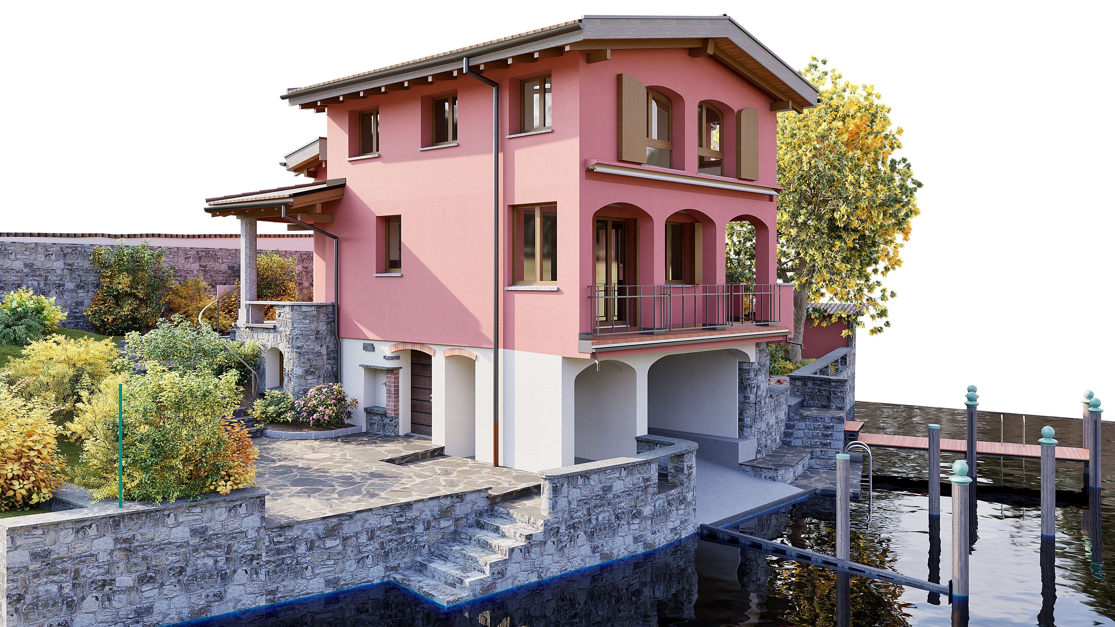 Ein rosafarbenes Haus mit Steinterrasse und Garten am Wasser, umgeben von herbstlichen Bäumen.