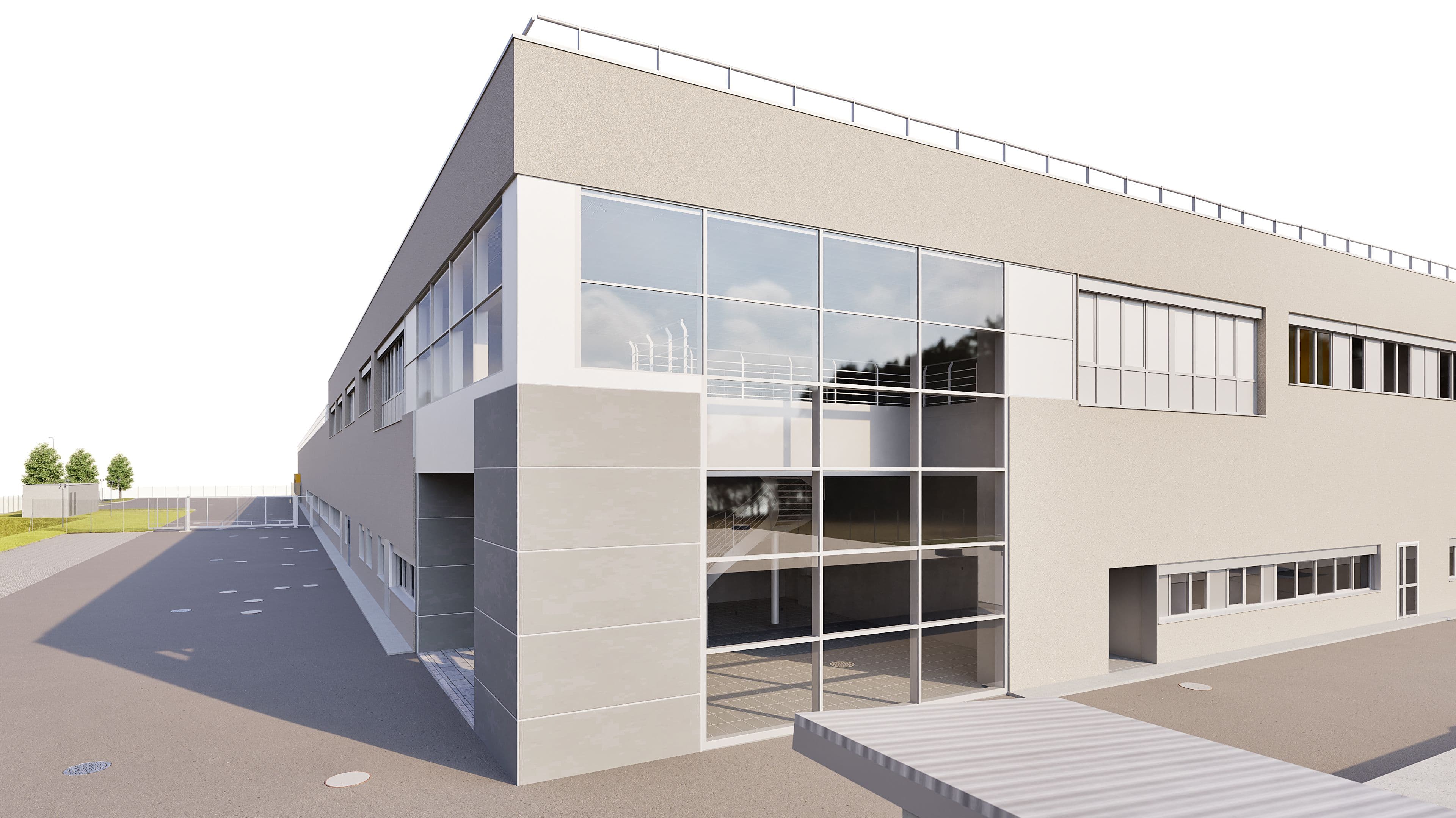 Modernes Industriegebäude mit großen Glasfenstern und grauer Fassade.