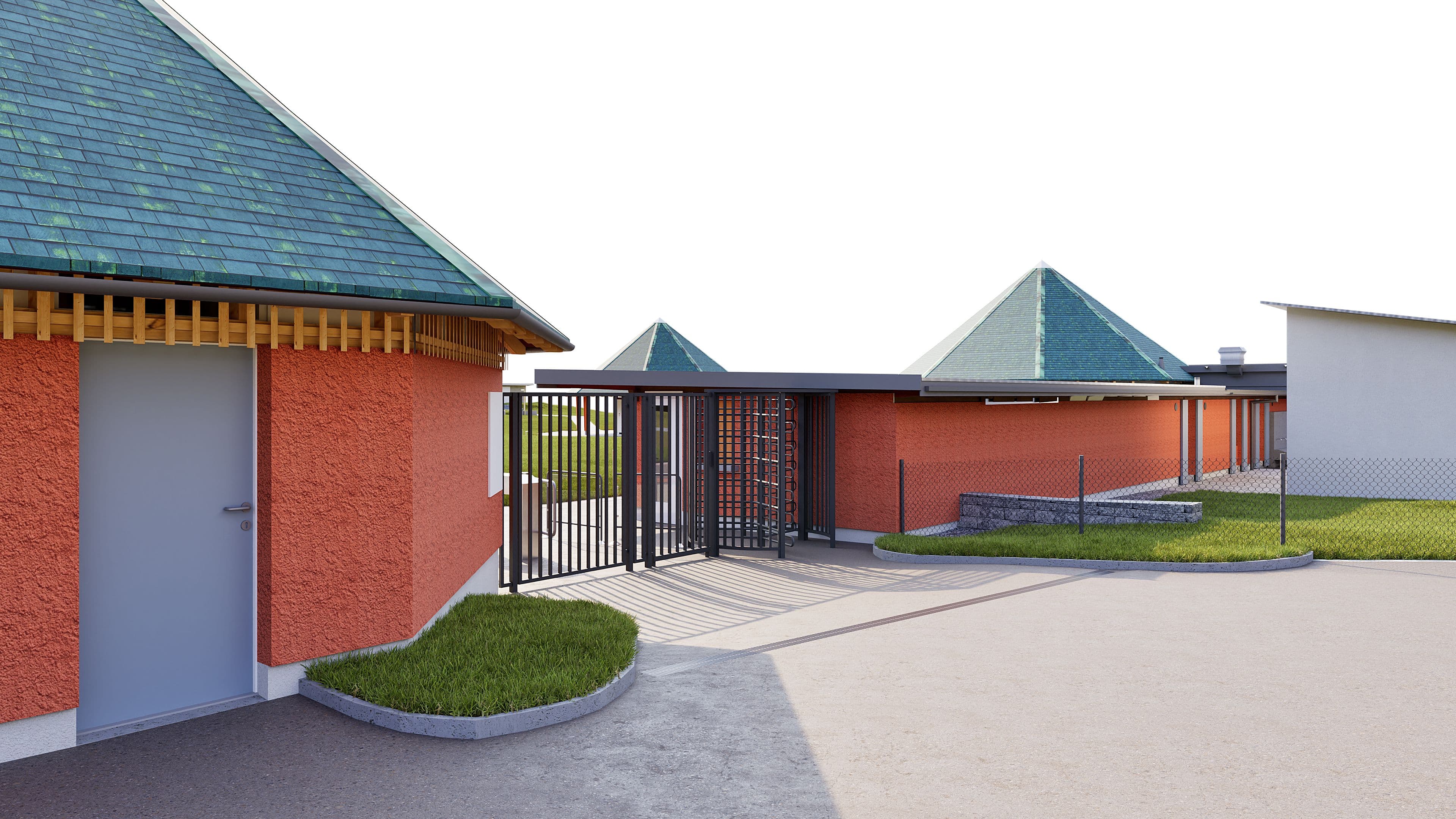 3D-Visualisierung eines modernen Gebäudekomplexes mit roten Wänden, grünen Pyramidendächern und Metallzaun am Eingang, gepflasterter Zufahrt und Grünflächen.