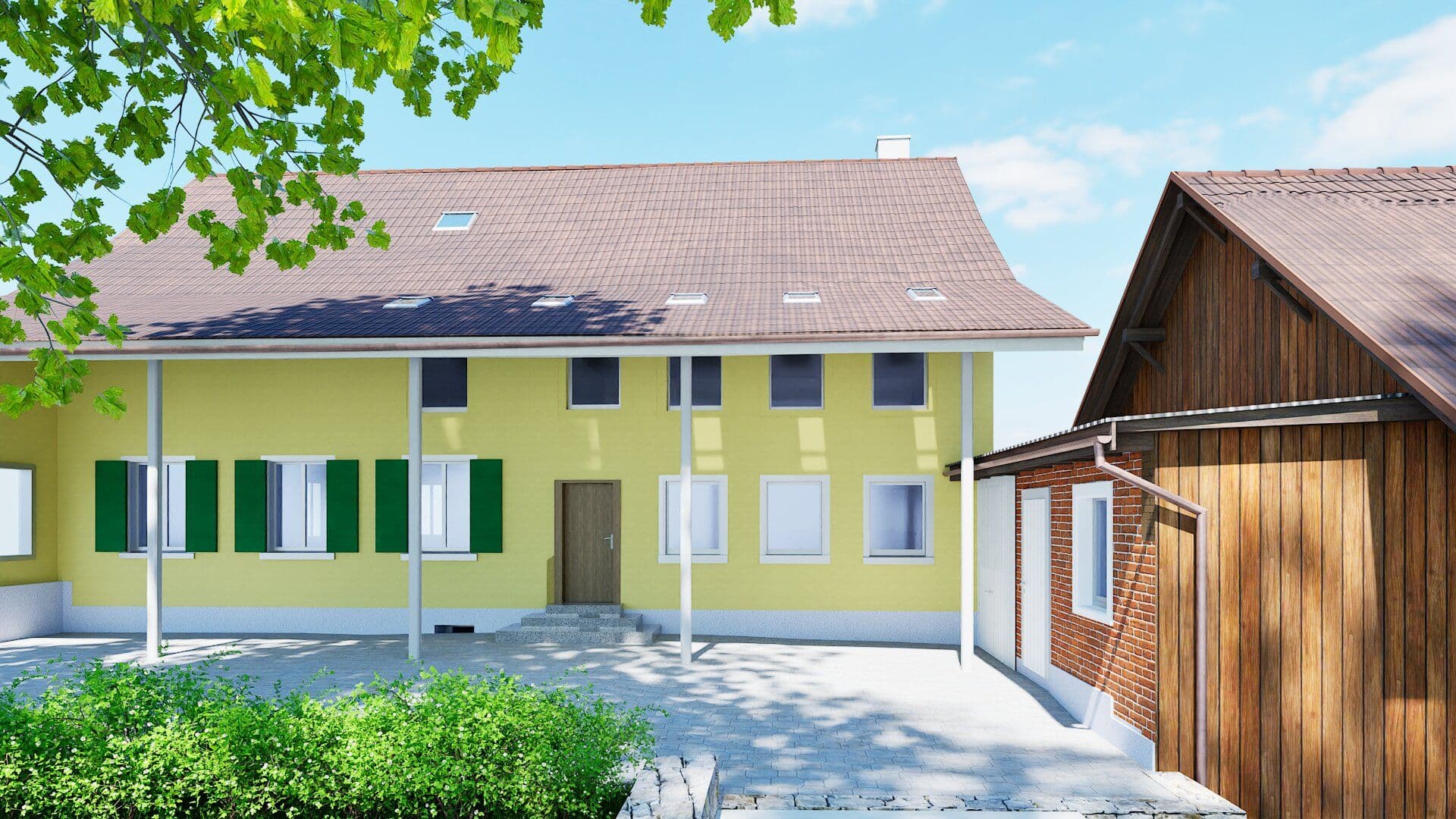 Gelbes Wohnhaus mit grünen Fensterläden und Nebengebäude unter blauem Himmel.