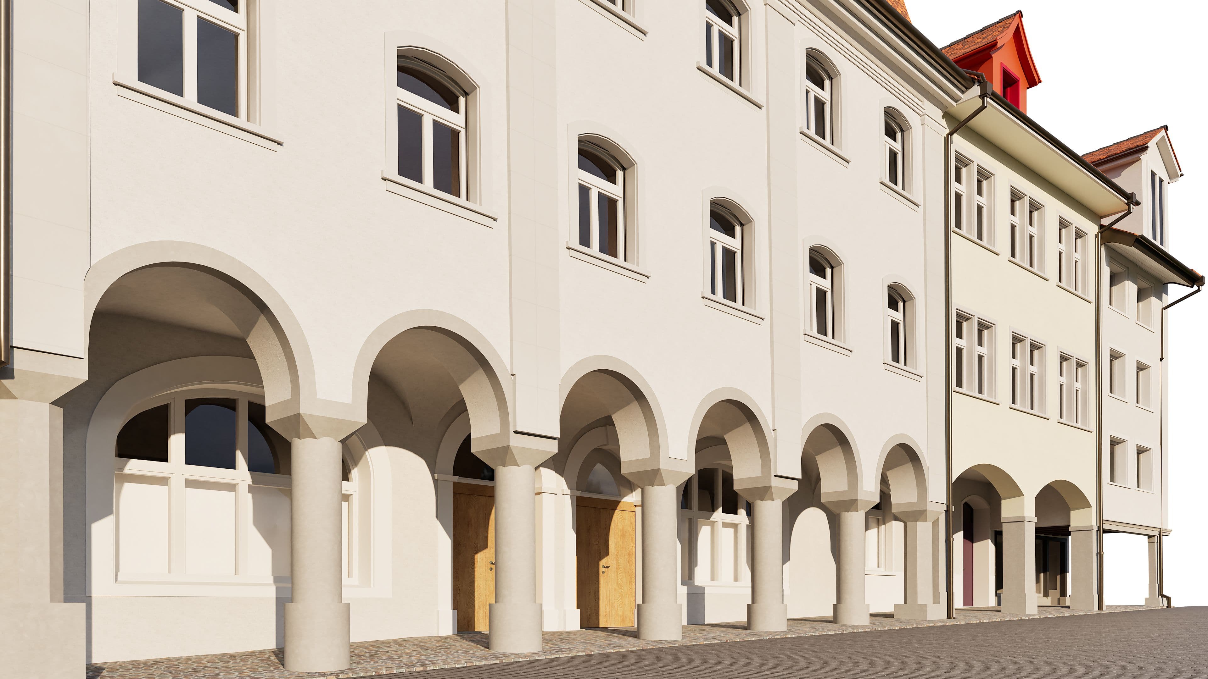 Historische Stadthäuser mit Bögen in einer europäischen Altstadt.