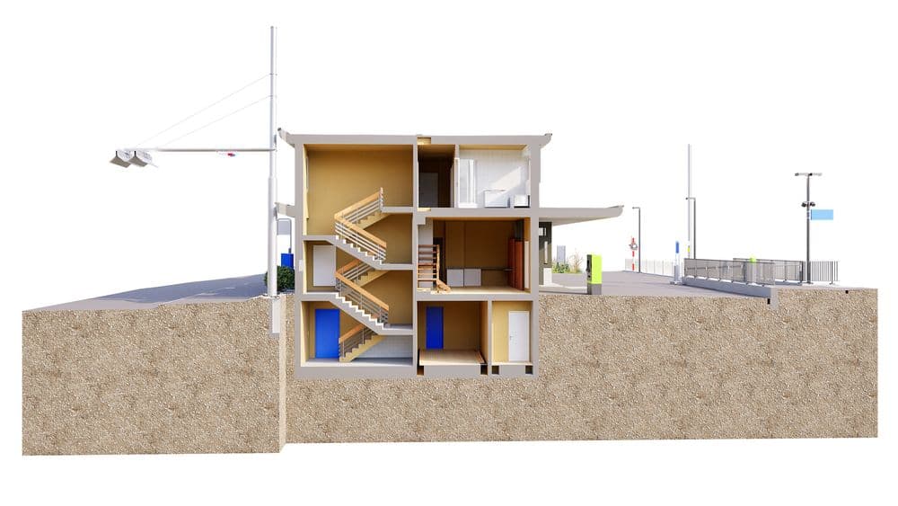 3D-Schnittansicht eines Gebäudes in Bodenquerschnitt mit Treppenhaus und mehreren Räumen, daneben Straßen- und Bahnübergang-Elemente, Architekturvisualisierung mit Erdreich und Infrastruktur.