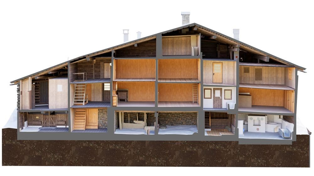 Schnitt durch ein historisches Wohnhaus in Graubünden als detailliertes 3D-BIM-Modell in Vectorworks mit sichtbarer Tragstruktur, Geschossen und Natursteinfundament.