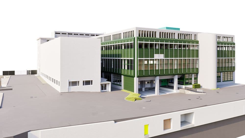 Modernes Lager- und Logistikgebäude mit grün-weißer Fassade.