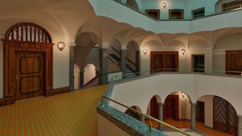 Großes, elegant beleuchtetes Atrium mit kunstvollen Holztüren, gewölbten Decken und verziertem Teppich.