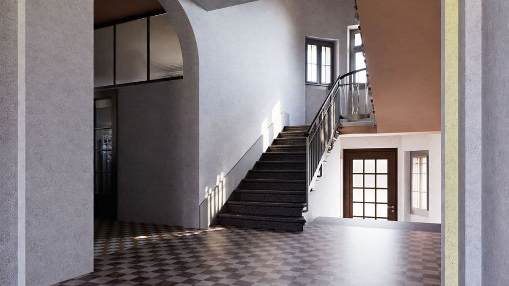 Heller Hauseingang mit Treppenaufgang, großen Fenstern und klassischem Schachbrettmuster-Boden.