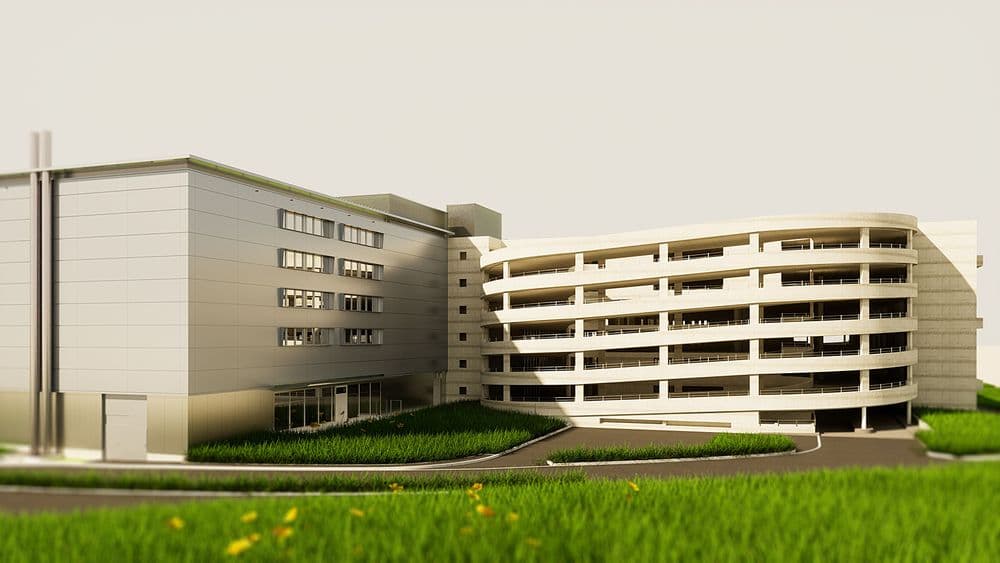Moderner Parkhaus-Entwurf mit mehreren Etagen und begrünter Umgebung.