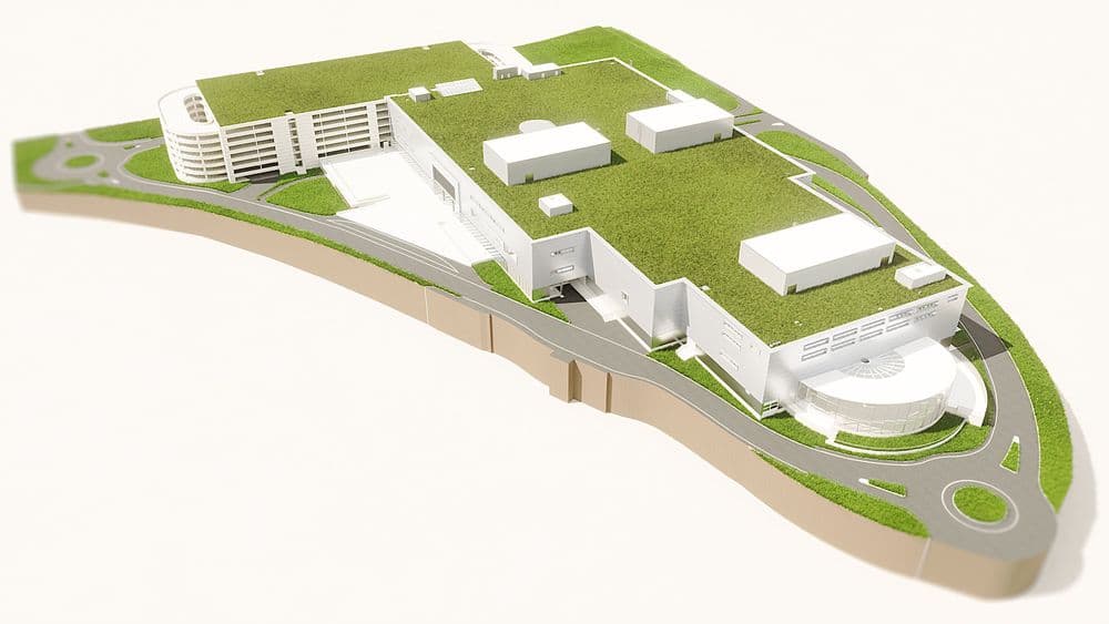 3D-Modell einer modernen Stadtplanung mit Gebäuden und Grünflächen.