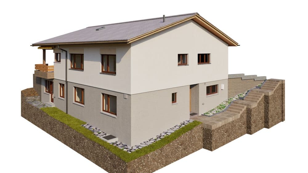 3D-Rendering eines modernen Einfamilienhauses mit Satteldach, Balkon und Fenstern, auf terrassiertem Grundstück mit Stützmauern und Grünstreifen, Ansicht von hinten/seitlich.