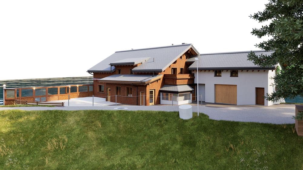 3D-Visualisierung eines modernen Holz-Chalets mit grauem Satteldach, großer Terrasse und Garage, umgeben von Wiese und Zaun in ländlicher Umgebung.