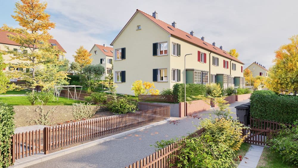 Mehrfamilienhaus im Grünen mit Vorgärten und Spazierweg.