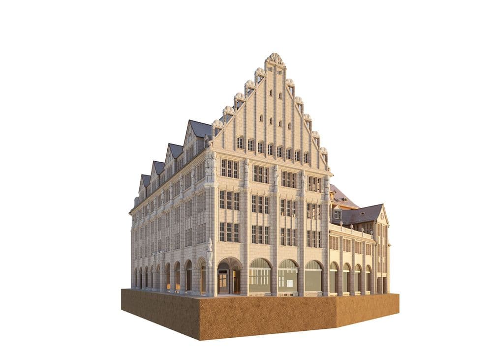 Historisches Gebäude mit steiler Giebelfront und Arkaden.