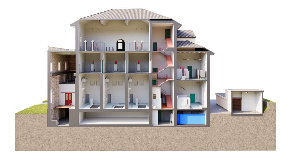 Querschnitt eines mehrstöckigen Gebäudes, das diverse Innenräume und Etagen zeigt. Ideal für Studien zu Architektur und Gebäudestruktur.