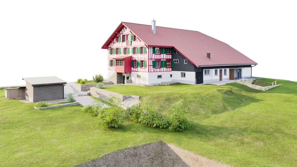 Alpines Haus mit roten Fensterläden in grüner Hügellandschaft.