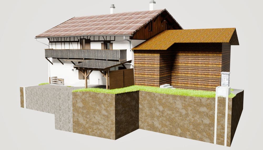 Ein traditionelles zweistöckiges Haus mit Holzdetails und Schrägdach, neben einem modernen Holzgebäude auf grasbewachsenem Untergrund.