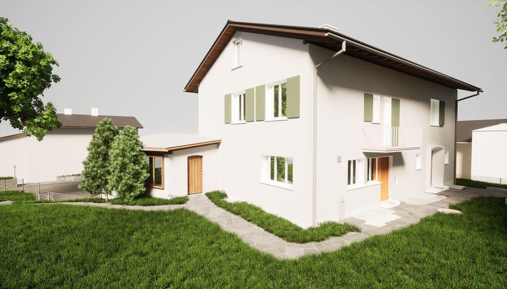 Einfamilienhaus mit gepflegtem Garten und Garage bei Tageslicht.