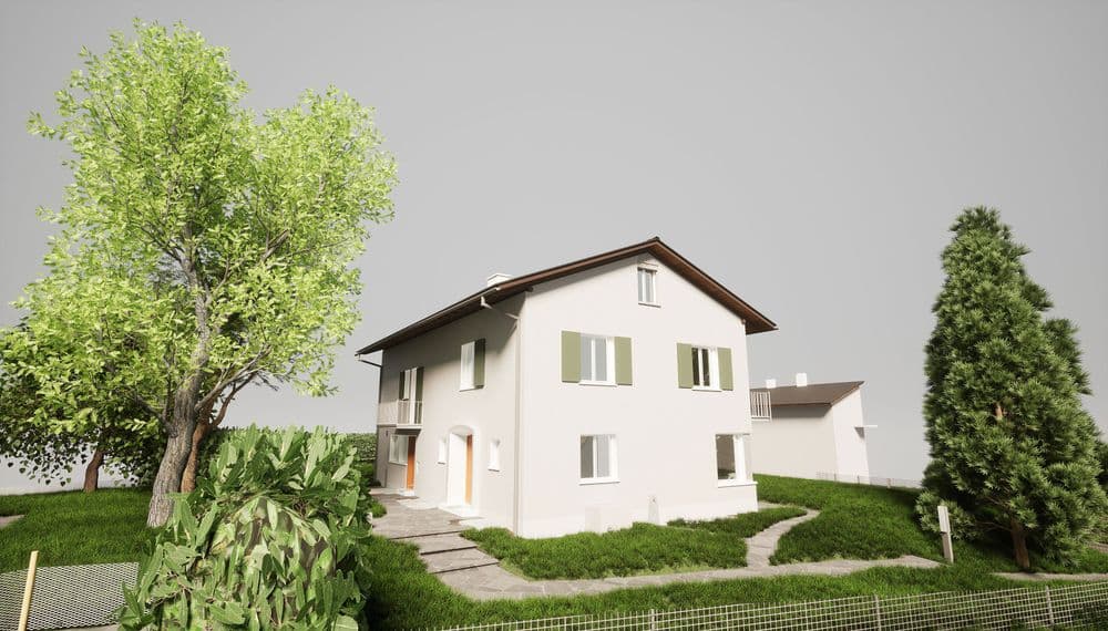 Moderneres Einfamilienhaus in grüner Umgebung mit Bäumen und Rasenfläche.