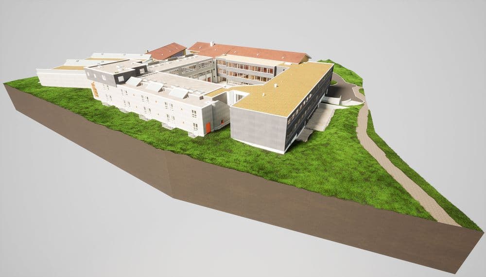 3D-Darstellung eines Gebäudekomplexes auf einem Hang mit begrünten Flächen und einem Weg.