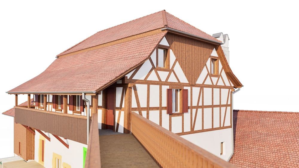 Fachwerkgebäude mit rotem Ziegeldach und Holzdetails, Teil einer historischen Struktur.