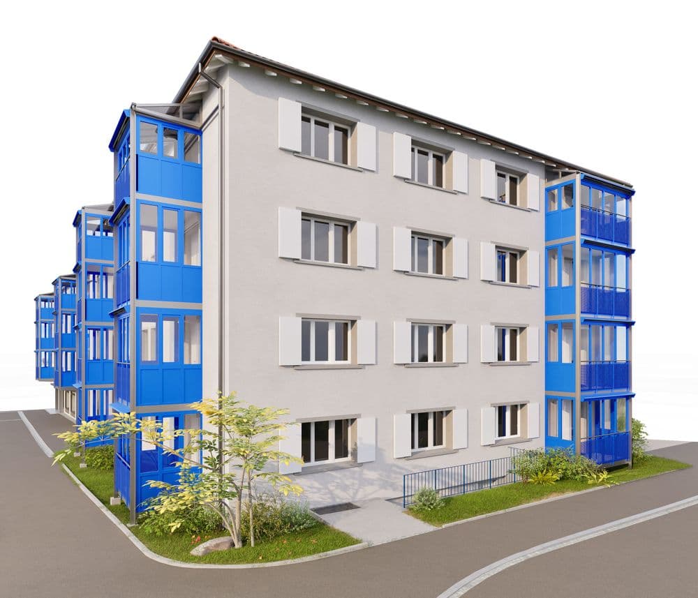 Mehrfamilienhaus mit blauen Balkonen und weißer Fassade, moderne Architektur.