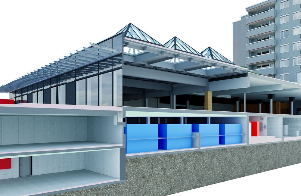 Es handelt sich um ein architektonisches Schnittbild eines modernen Gebäudekomplexes mit Glasfassaden und mehreren Stockwerken, das neben einem Hochhaus liegt.