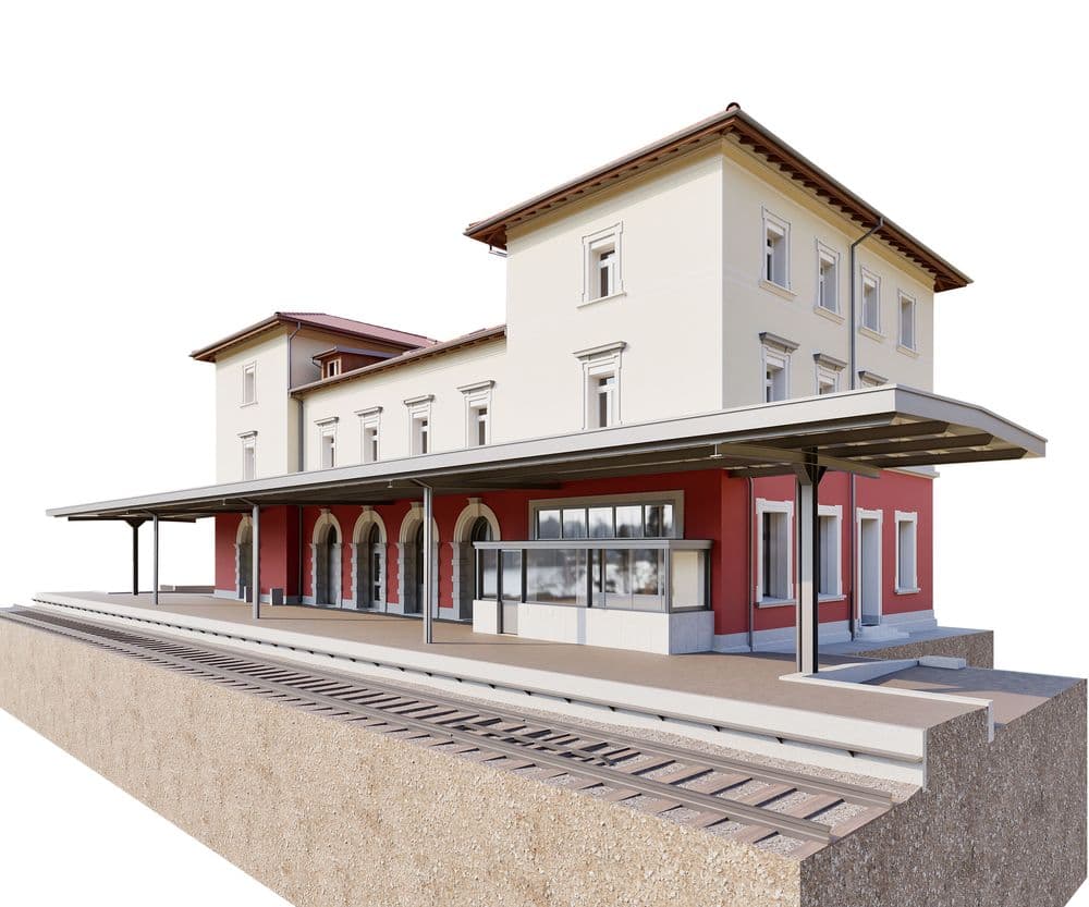 3D-Rendering eines historischen Bahnhofsgebäudes mit überdachtem Bahnsteig, Gleisen und Empfangsbereich, weiß-rote Fassade und Fensterreihen – Architekturvisualisierung für Modellbau und Bahnstation-Design.