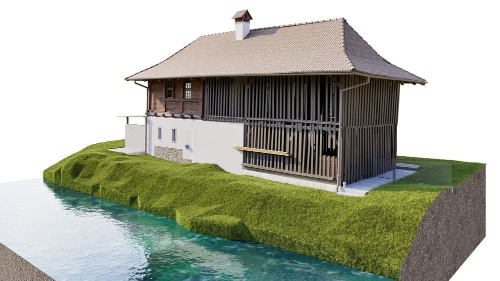 3D-Visualisierung eines traditionellen Holzhauses mit Schindeldach auf einer grasbewachsenen Uferböschung neben einem Bach; teilweise verputztes Untergeschoss, Holzlattenfassade und kleiner Balkon.