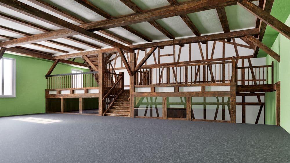 Geräumiger Dachboden mit sichtbaren Holzbalken, Empore und Holztreppe, grünen Wänden, Fensterlicht und großem leerem Boden – Innenraum in rustikalem Scheunenstil.