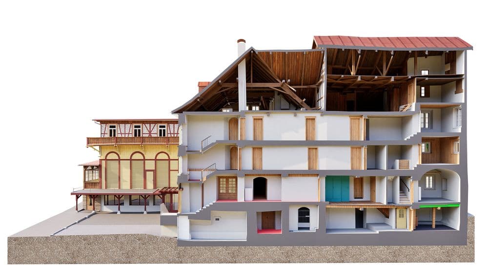 Architektur-Schnittmodell eines mehrstöckigen Gebäudes mit freigelegten Innenräumen, Dachstuhl und Etagen, daneben historisches Fachwerkhaus; 3D-Visualisierung auf weißem Hintergrund.
