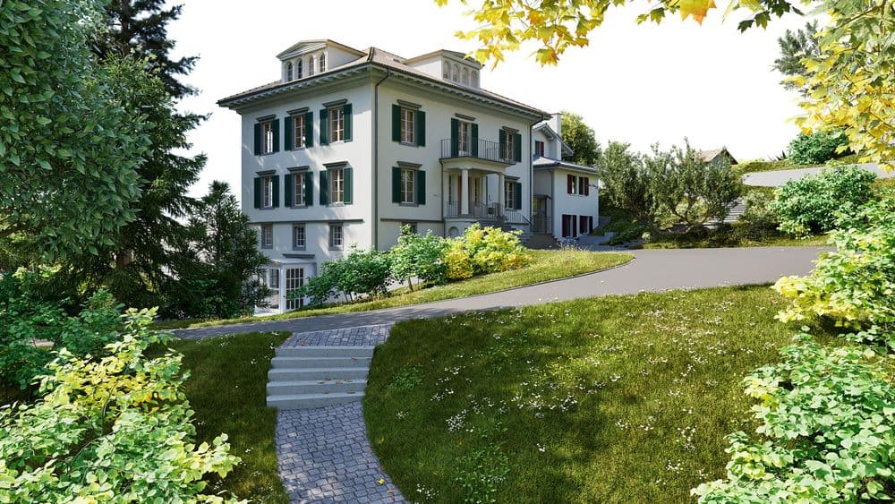 Elegante weiße Villa mit grünen Fensterläden und Balkon, umgeben von Garten und Bäumen, mit geschwungenem Weg und Treppe im sonnigen Außenbereich.