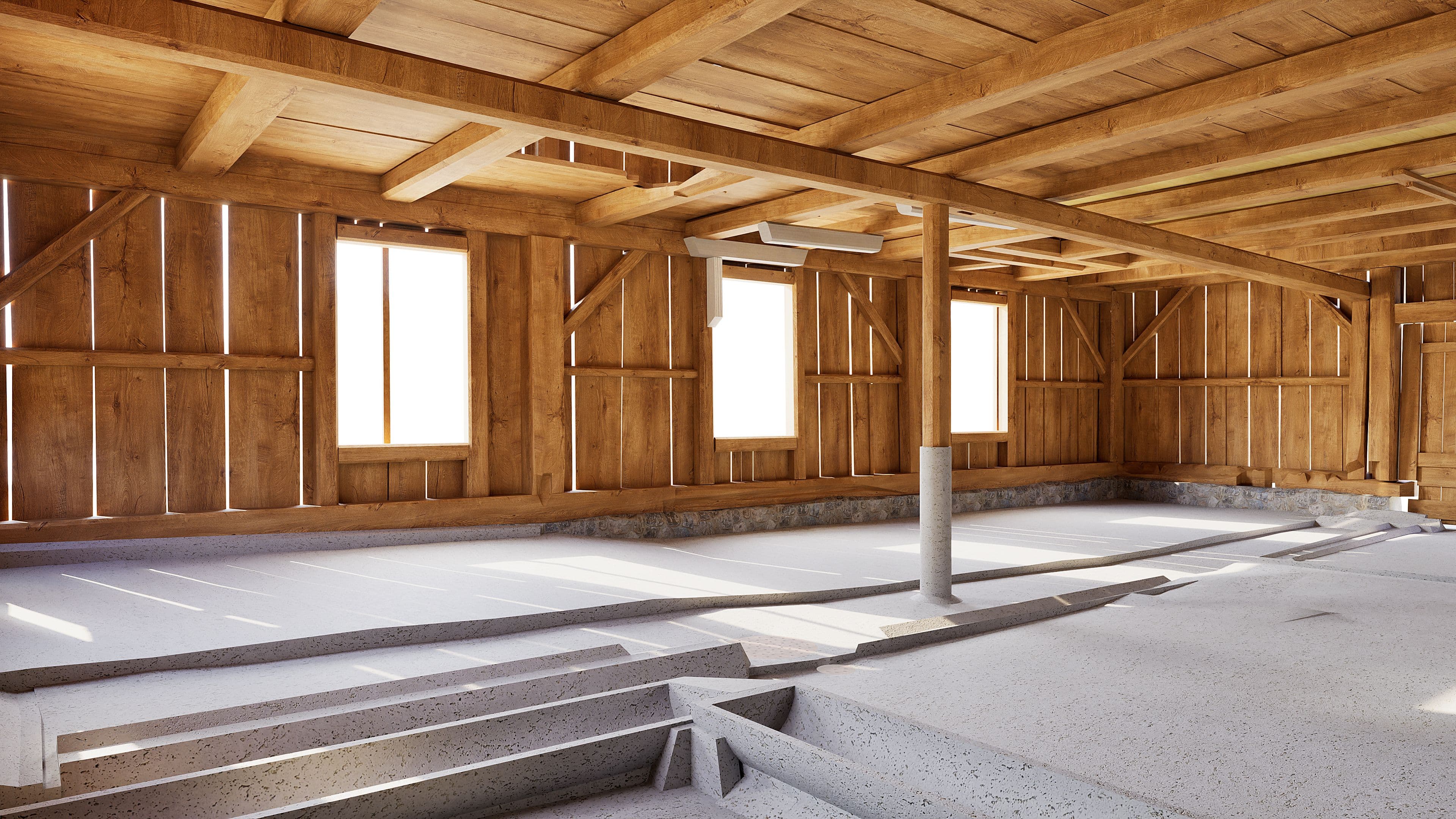 Innenansicht einer leeren Holzhütte/Scheune mit Holzdeckenbalken, Stützpfosten und mehreren Fenstern; Sonnenlicht fällt auf den Betonboden und Treppenstufen.